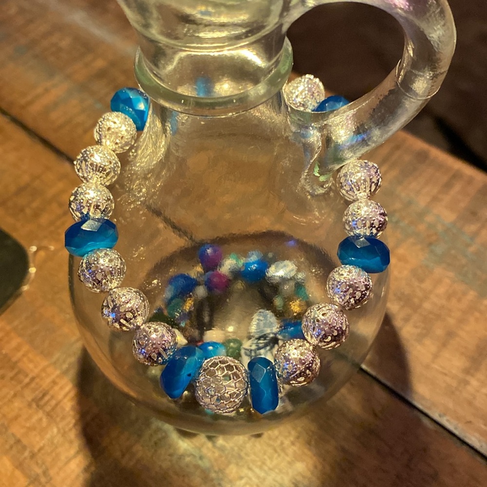 Handmade silver plated filigree beaded stretchy bracelet with aqua blue beads